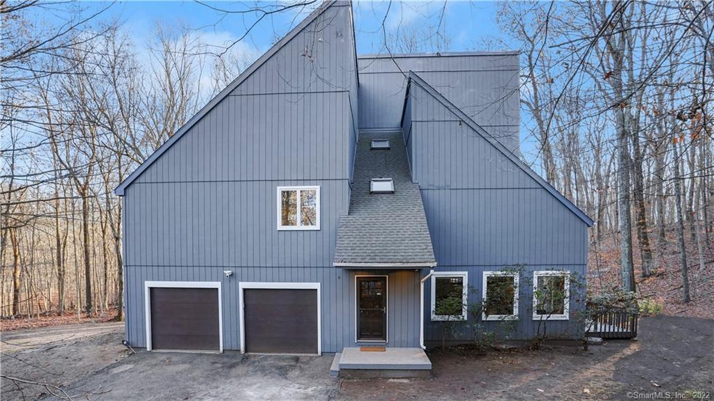 a view of a house with a roof deck