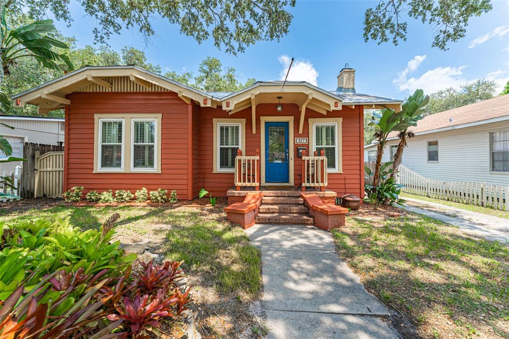 front view of a house with a yard