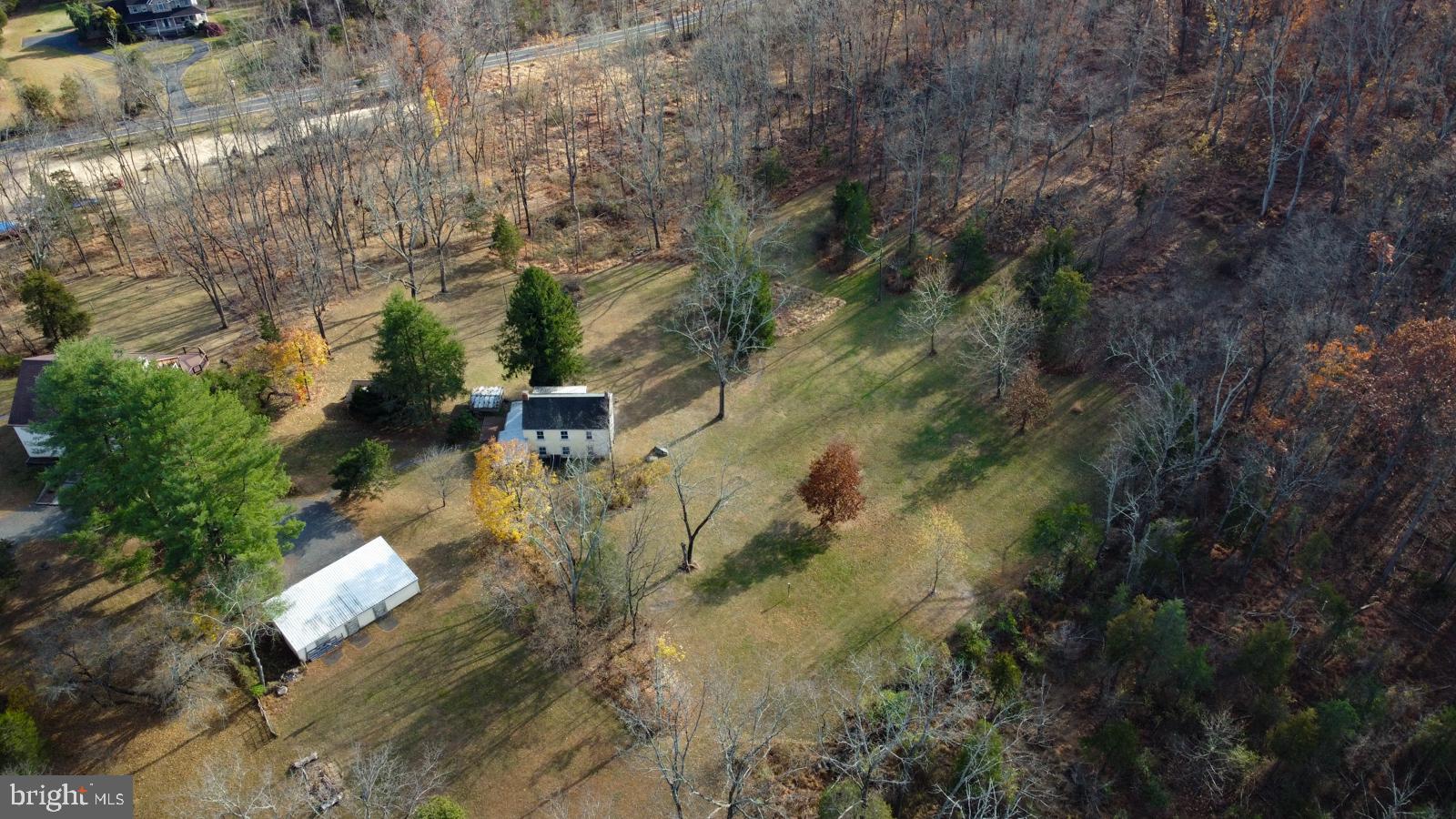 an aerial view of residential house with outdoor space