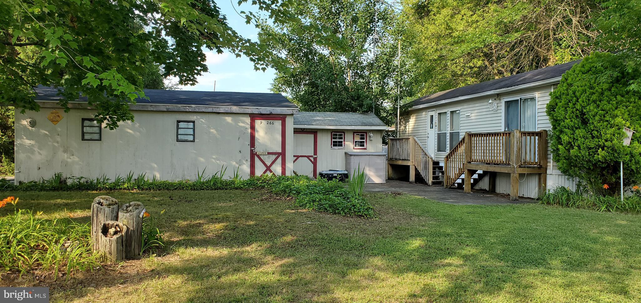 a view of a back yard of the house