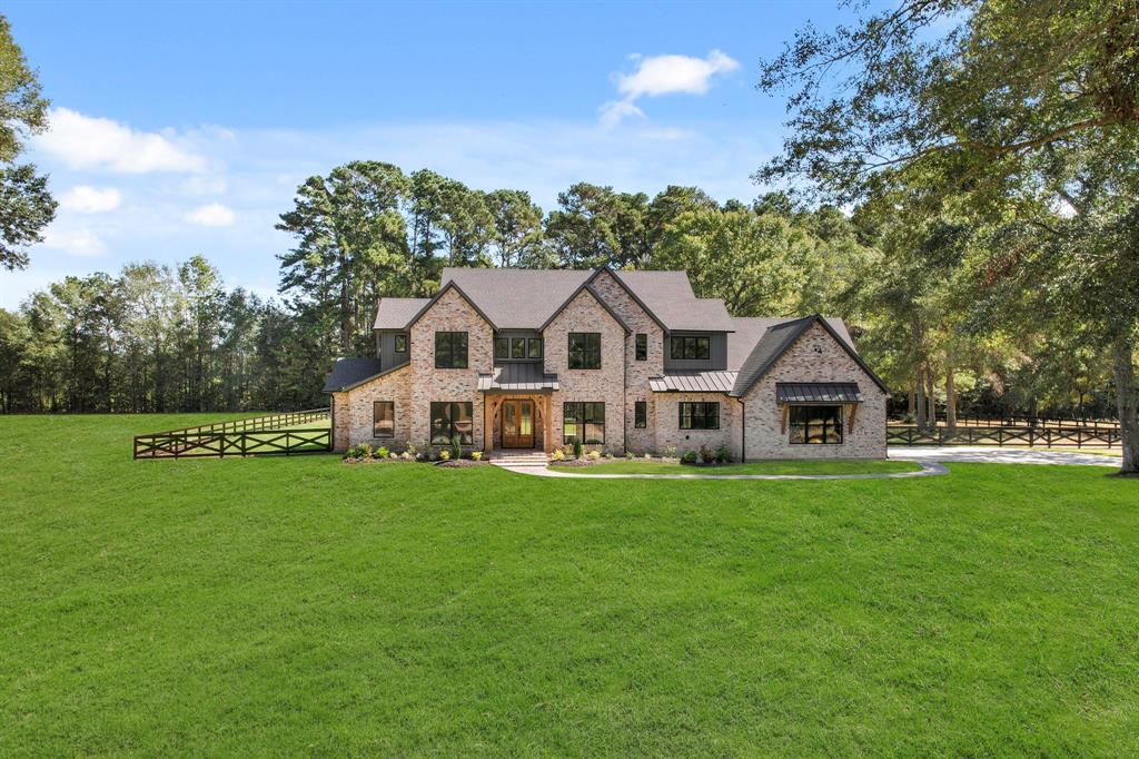 a view of a house with a big yard