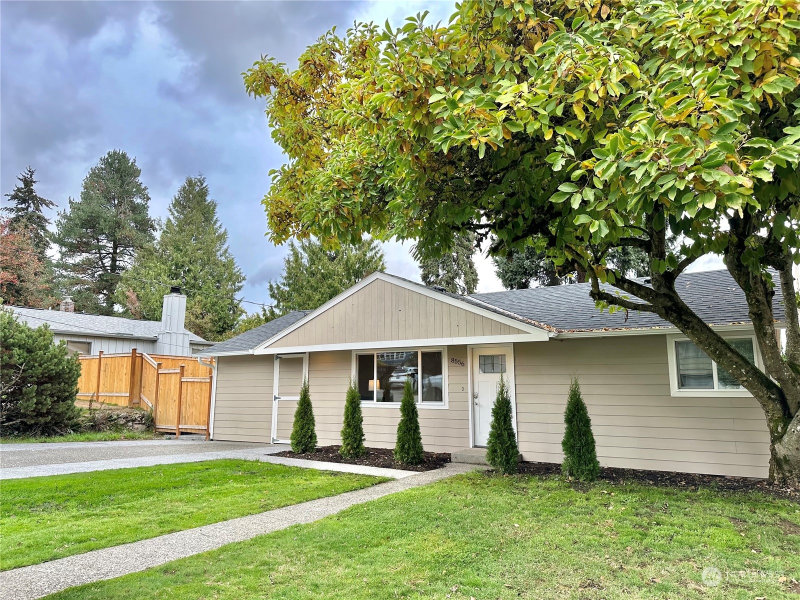 front view of a house with a yard