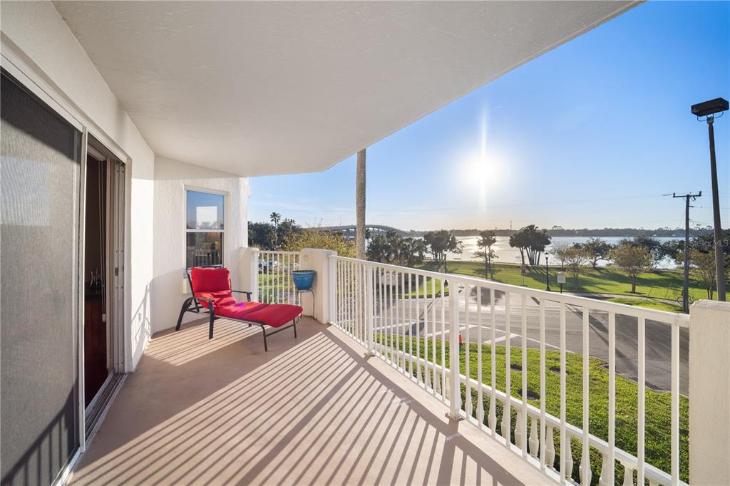 a view of balcony with chairs