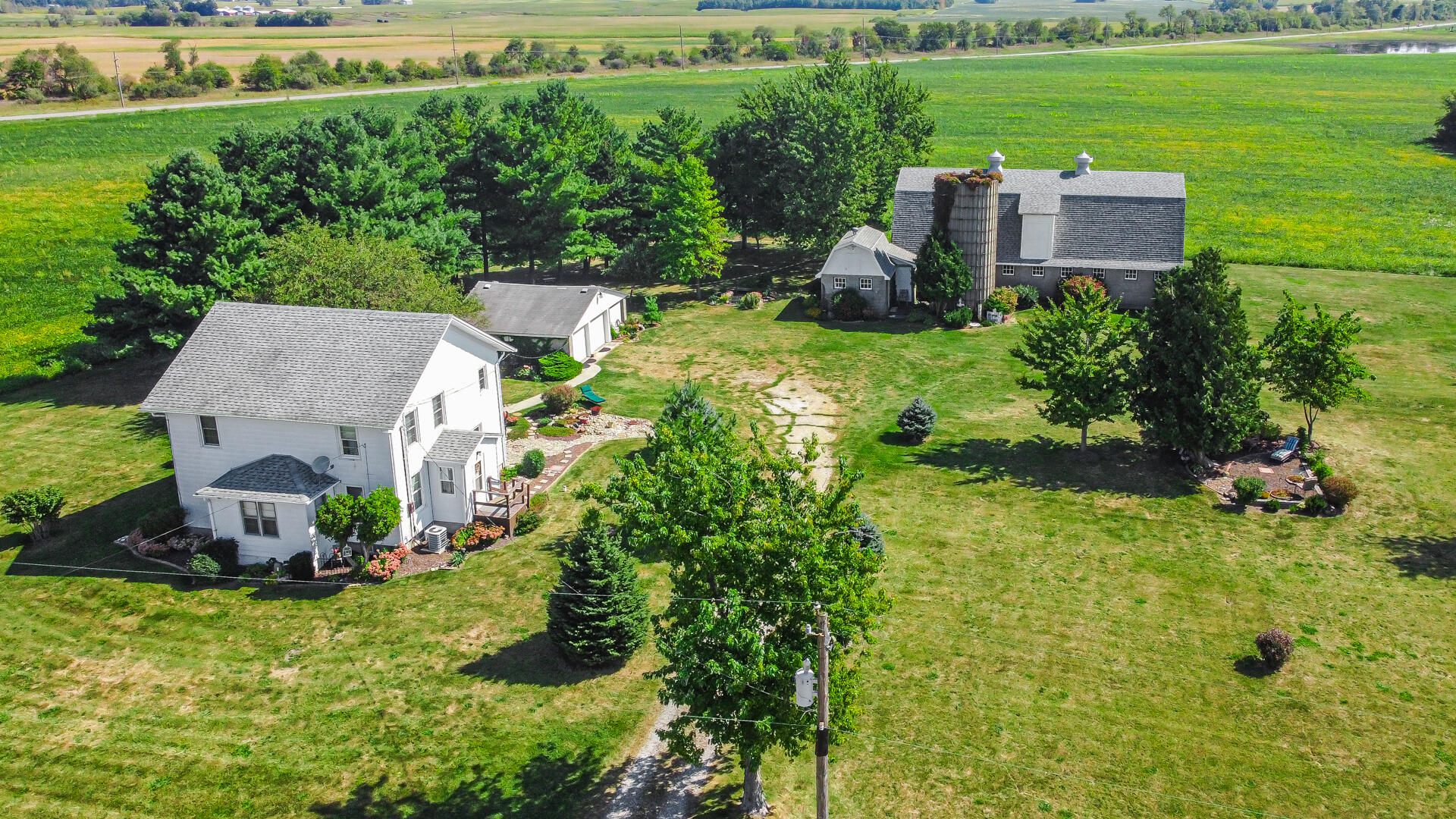 an aerial view of a house with a garden