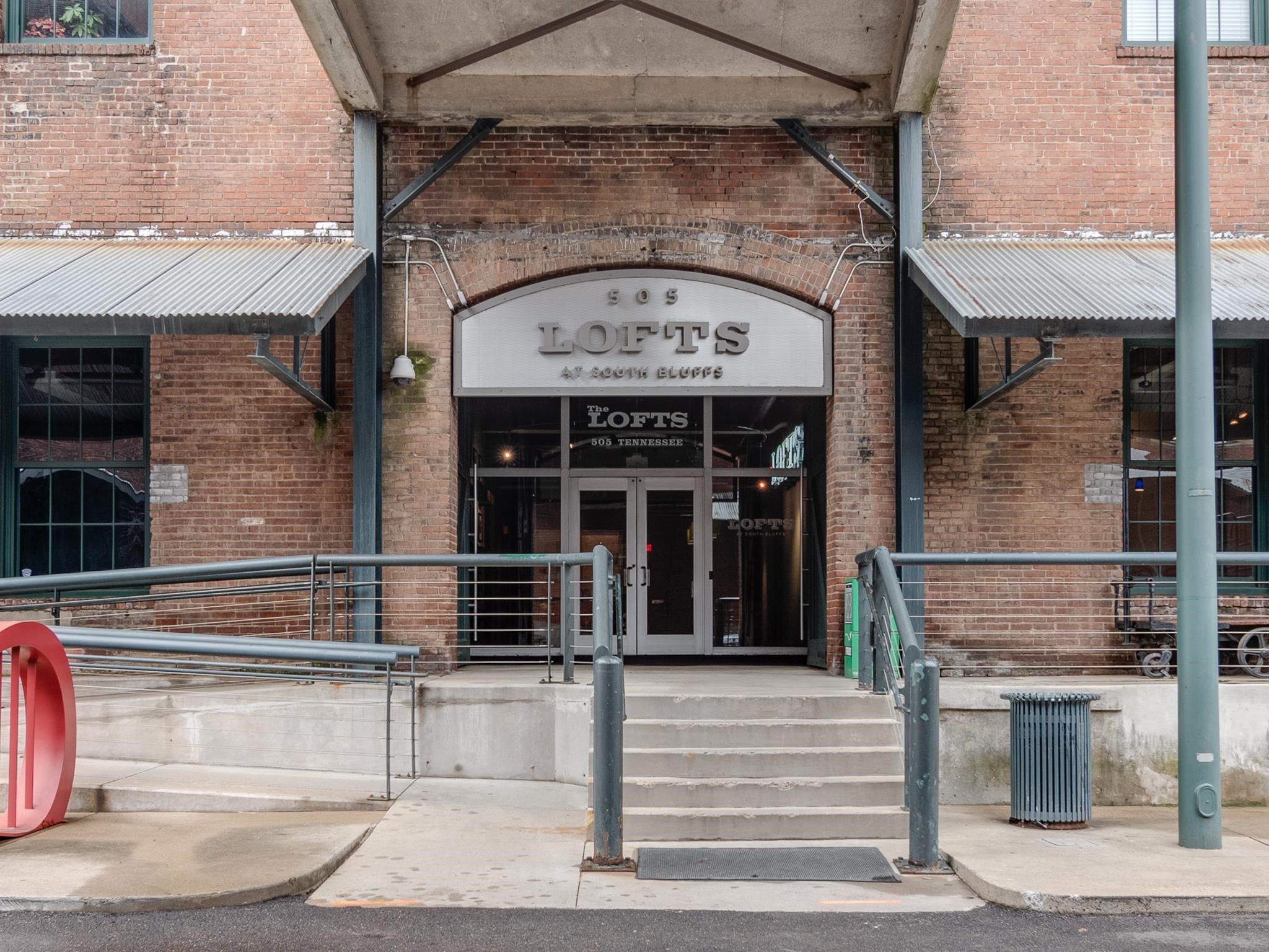 Property entrance featuring central air condition unit