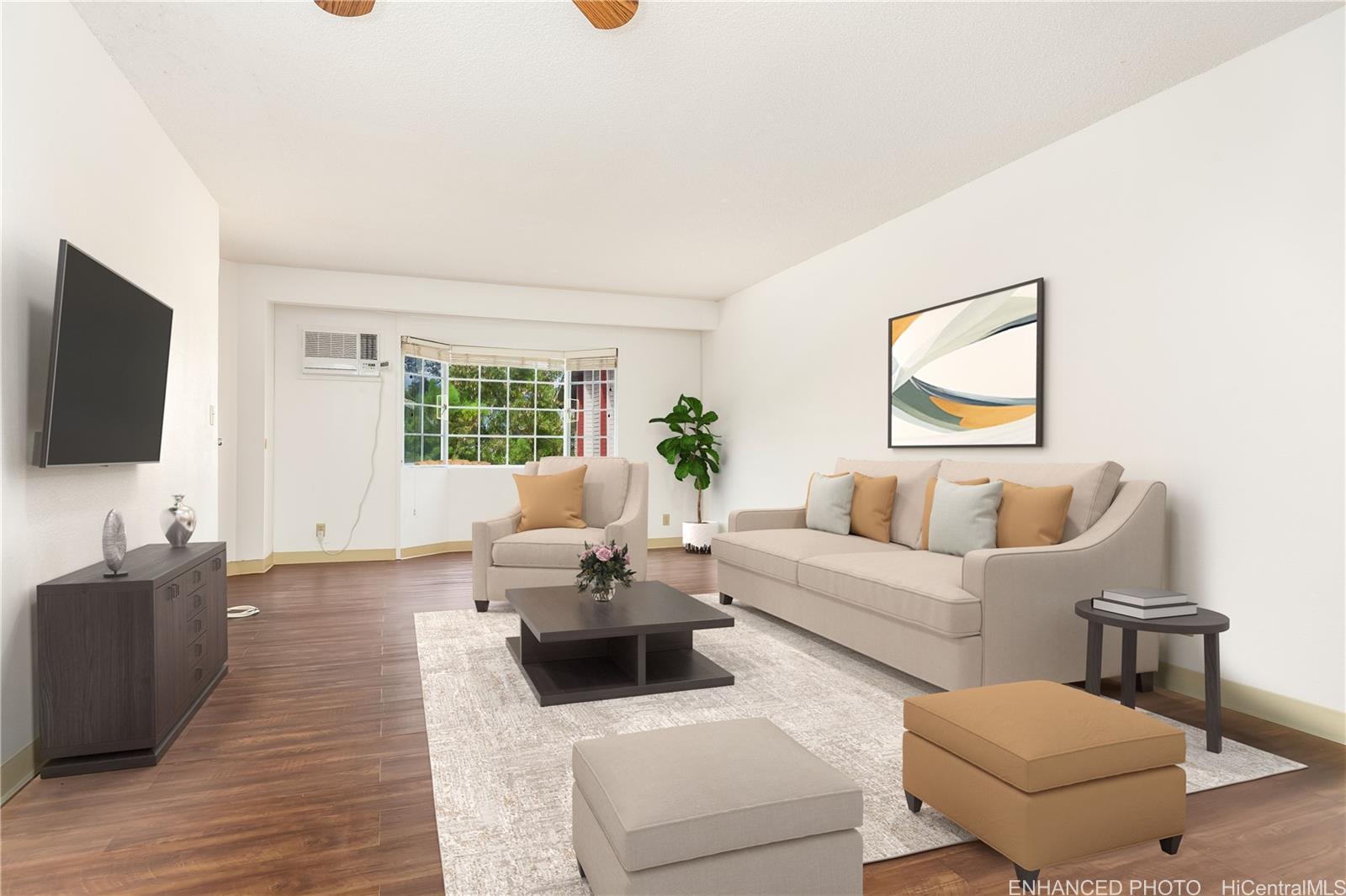 a living room with furniture and a flat screen tv