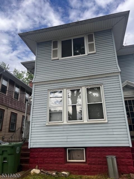 a front view of a house with a balcony