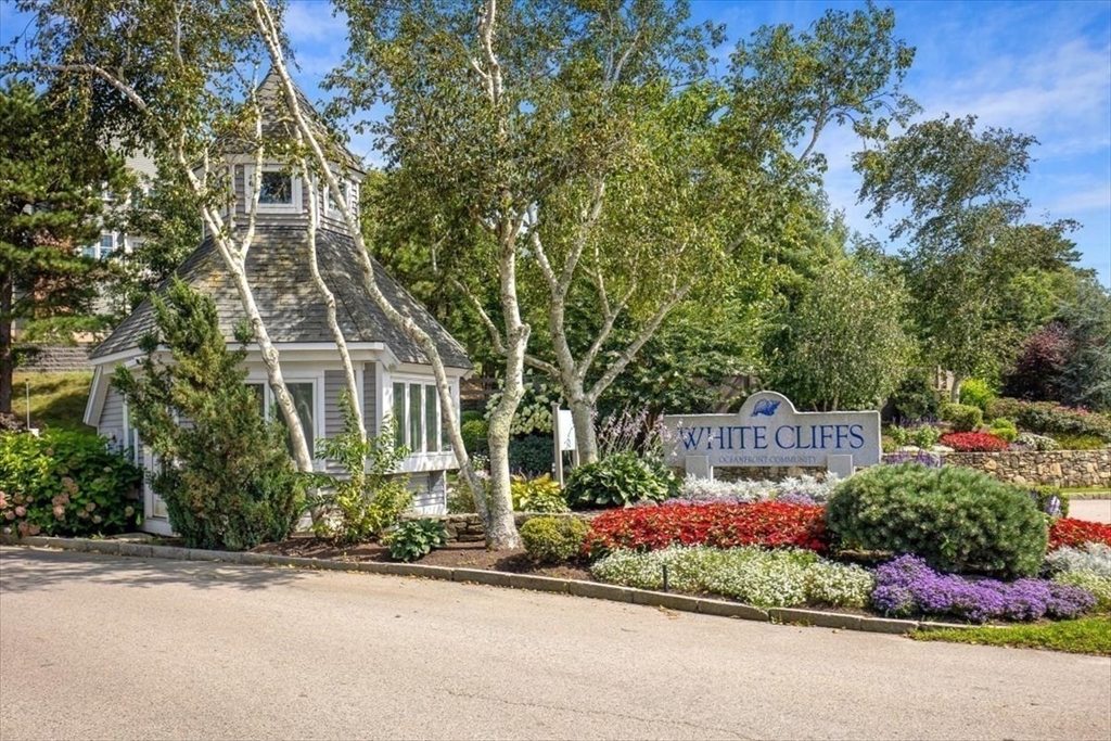 front view of a house next to a yard