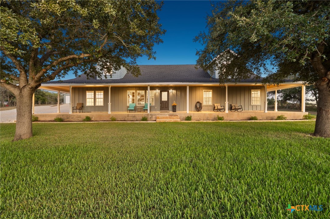 front view of a house with a yard