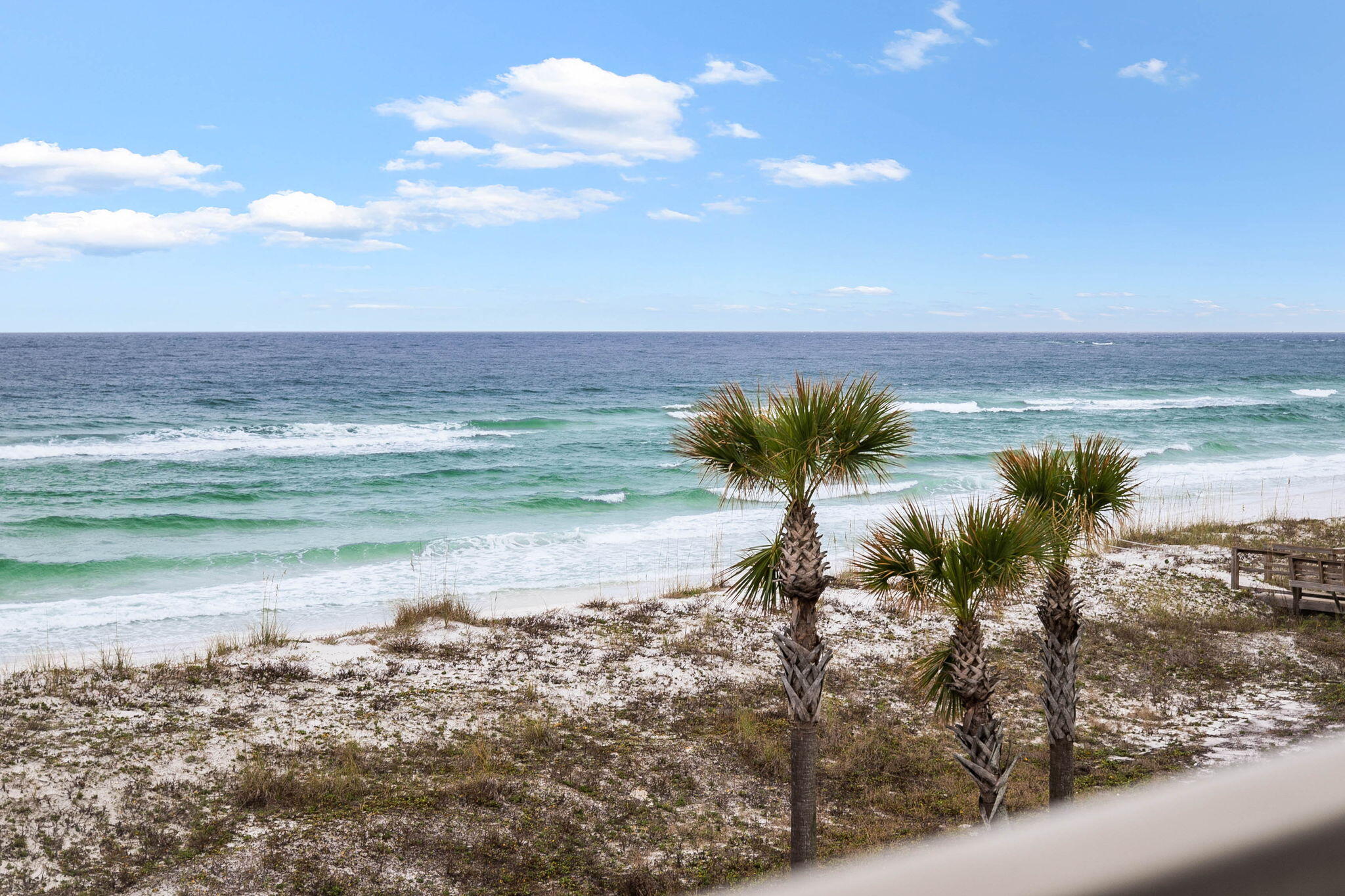 a view of a lake with beach and ocean