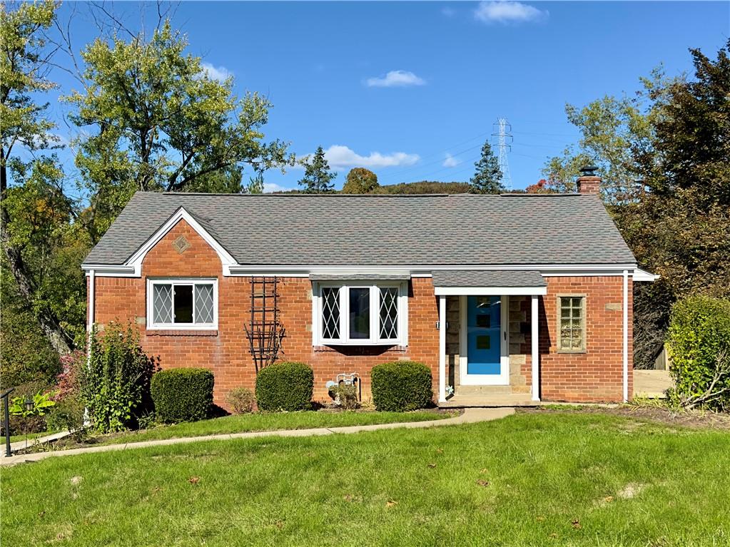 front view of house with a yard