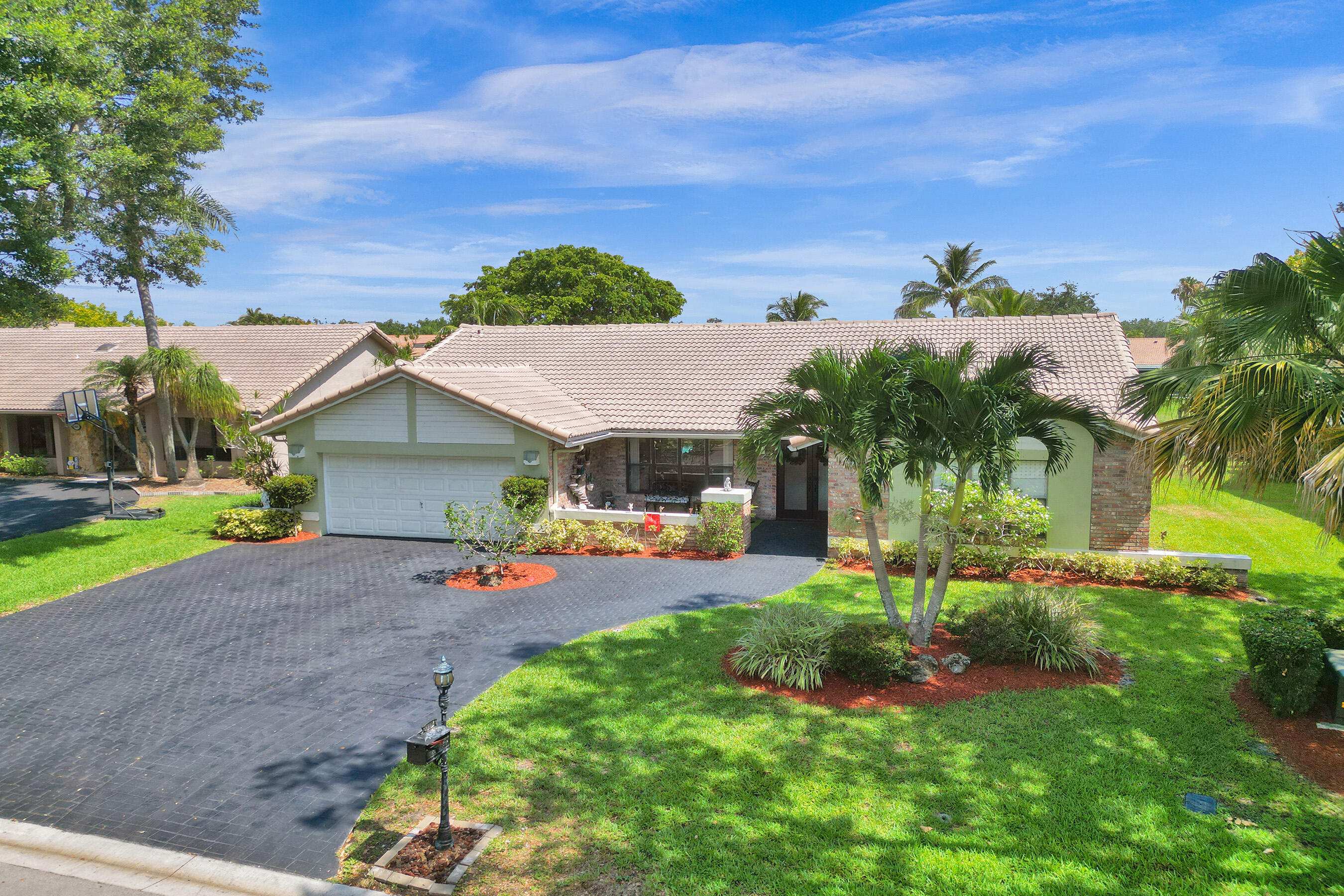 front view of a house with a yard