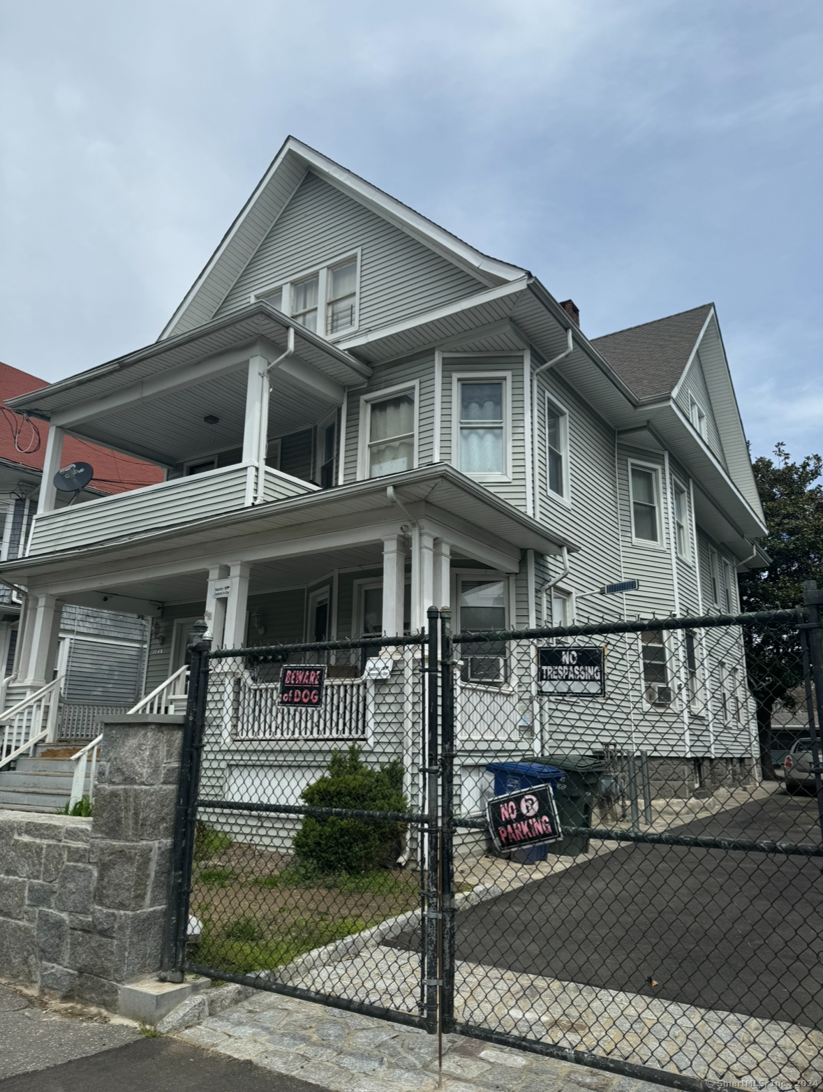 a front view of a house with garage