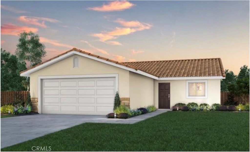 a view of a house with a yard and garage