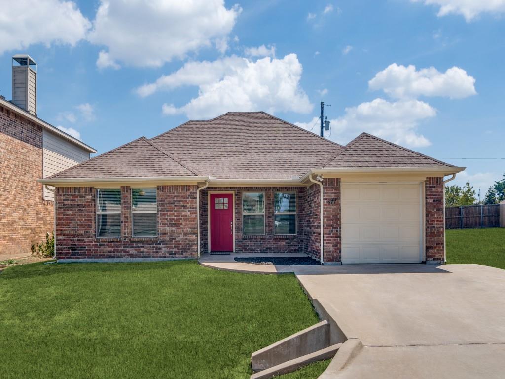 front view of a house with a yard