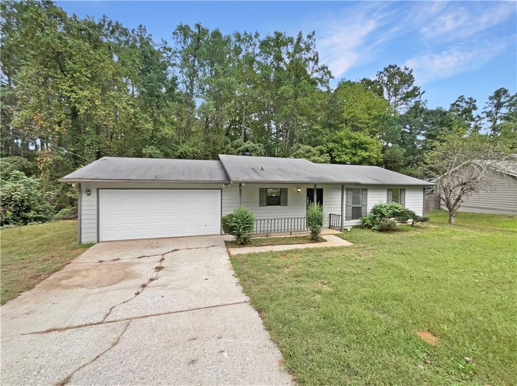 front view of a house with a yard