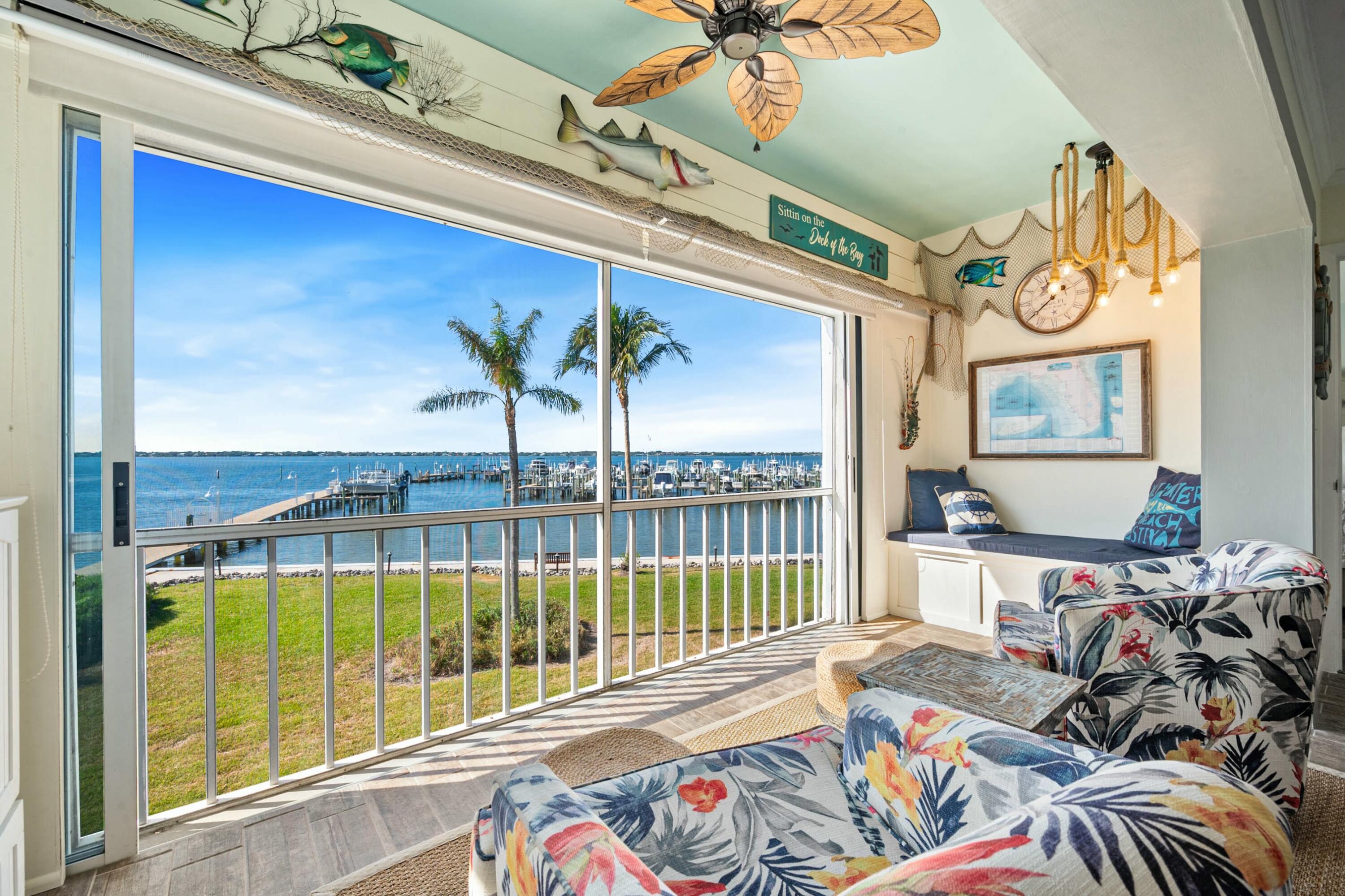 a view of a living room and a balcony