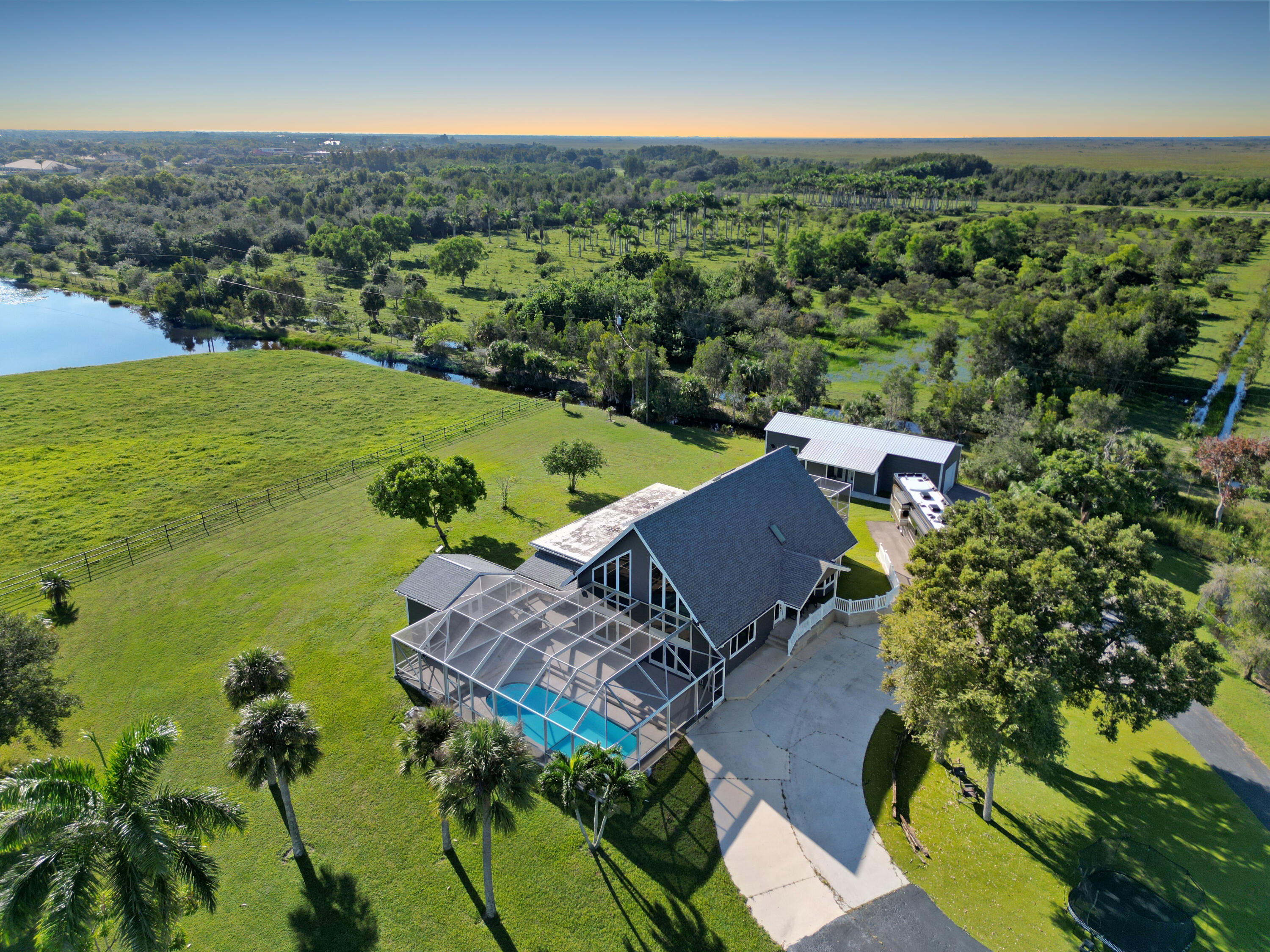 an aerial view of a house with a garden