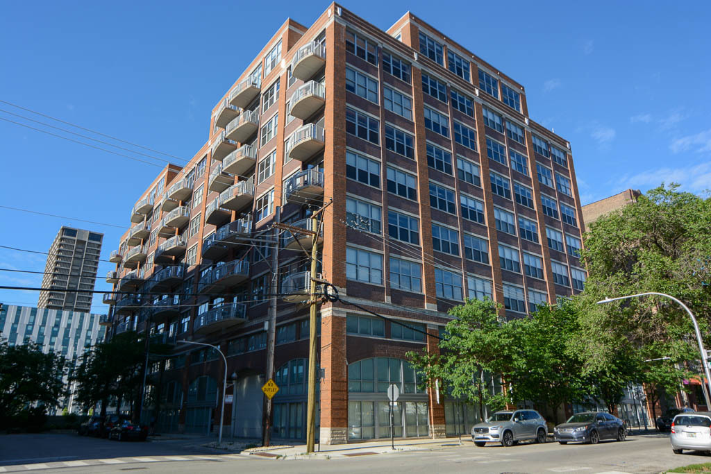 a view of a building and a street