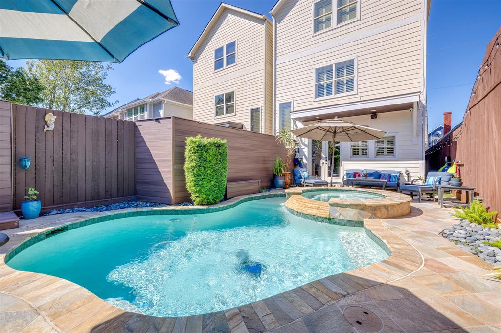 a view of a house with swimming pool