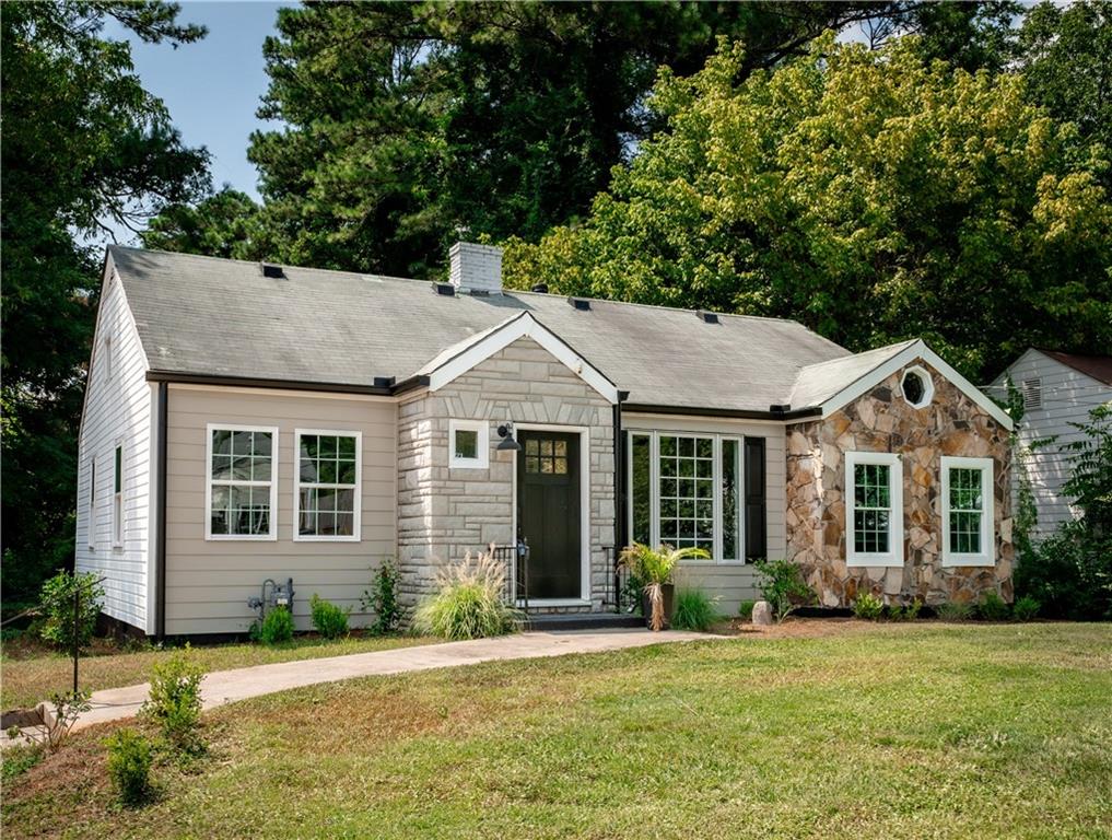 front view of a house with a yard