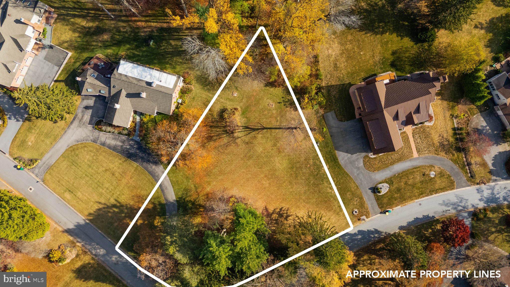 an aerial view of house with a swimming pool