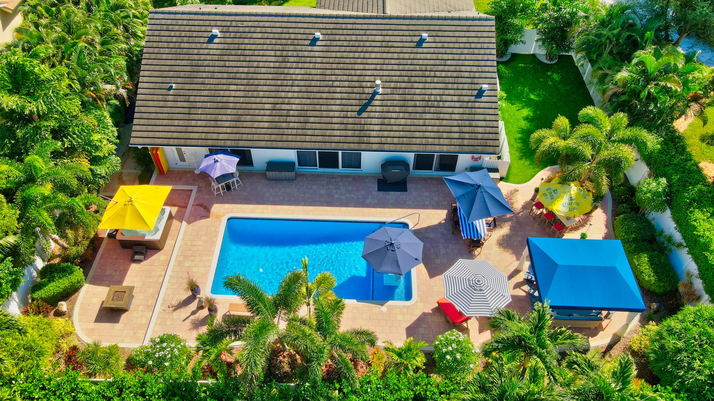 a view of swimming pool with sitting area