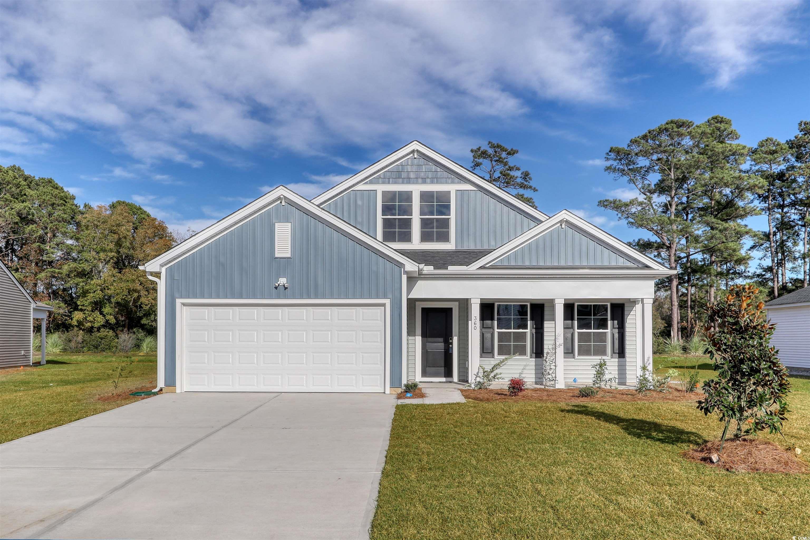 View of front of property featuring a front yard a