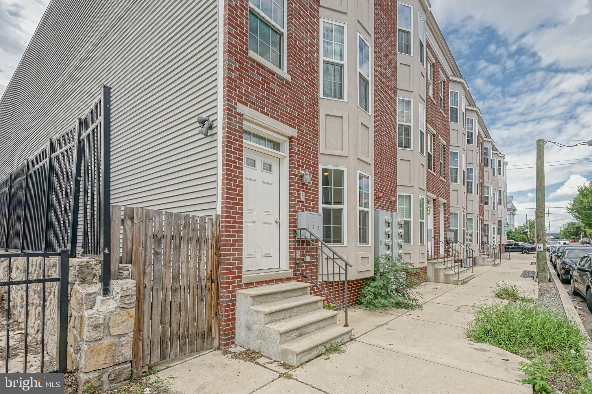 a front view of a building with street view