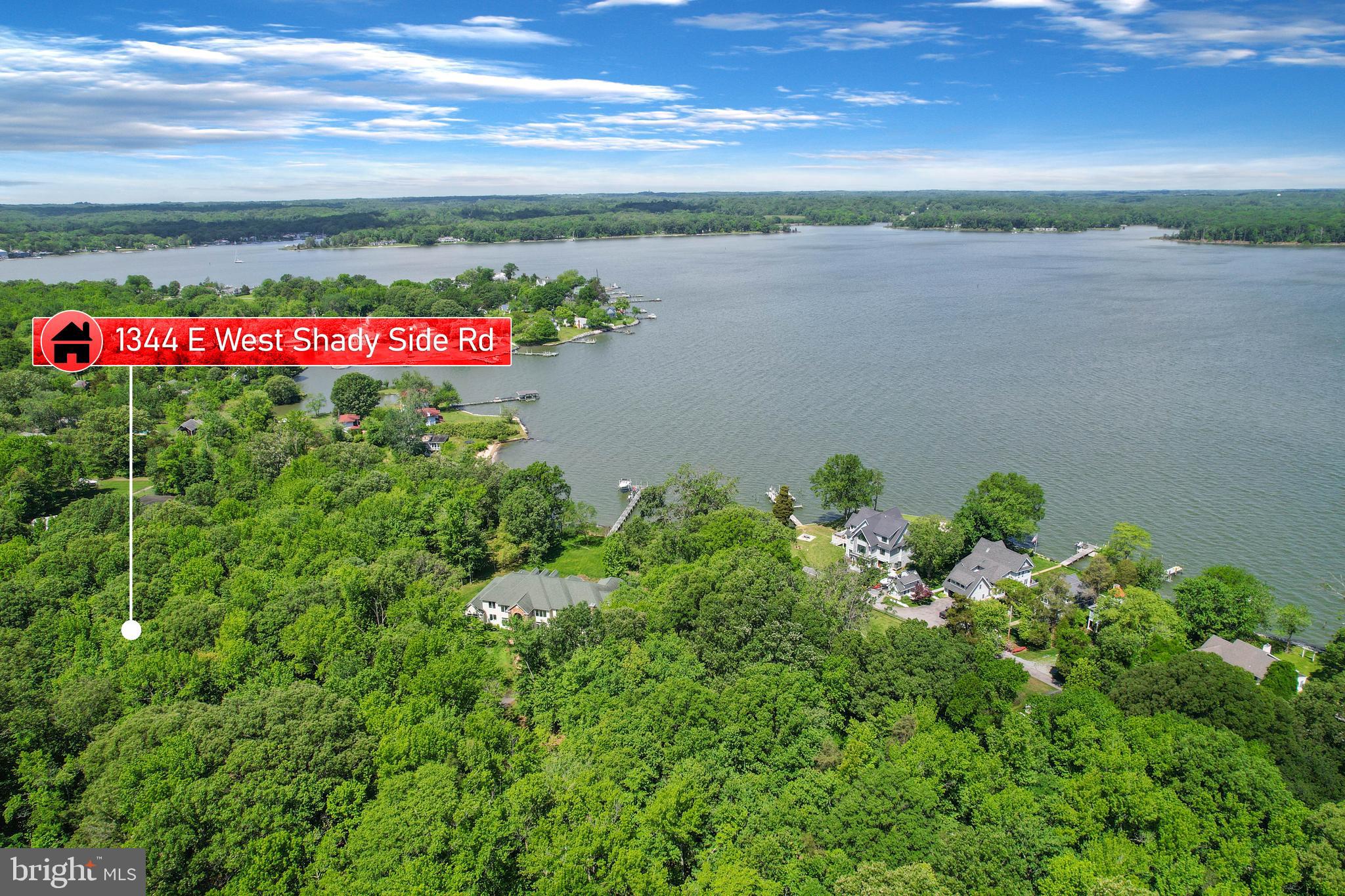 a view of a lake with a big yard