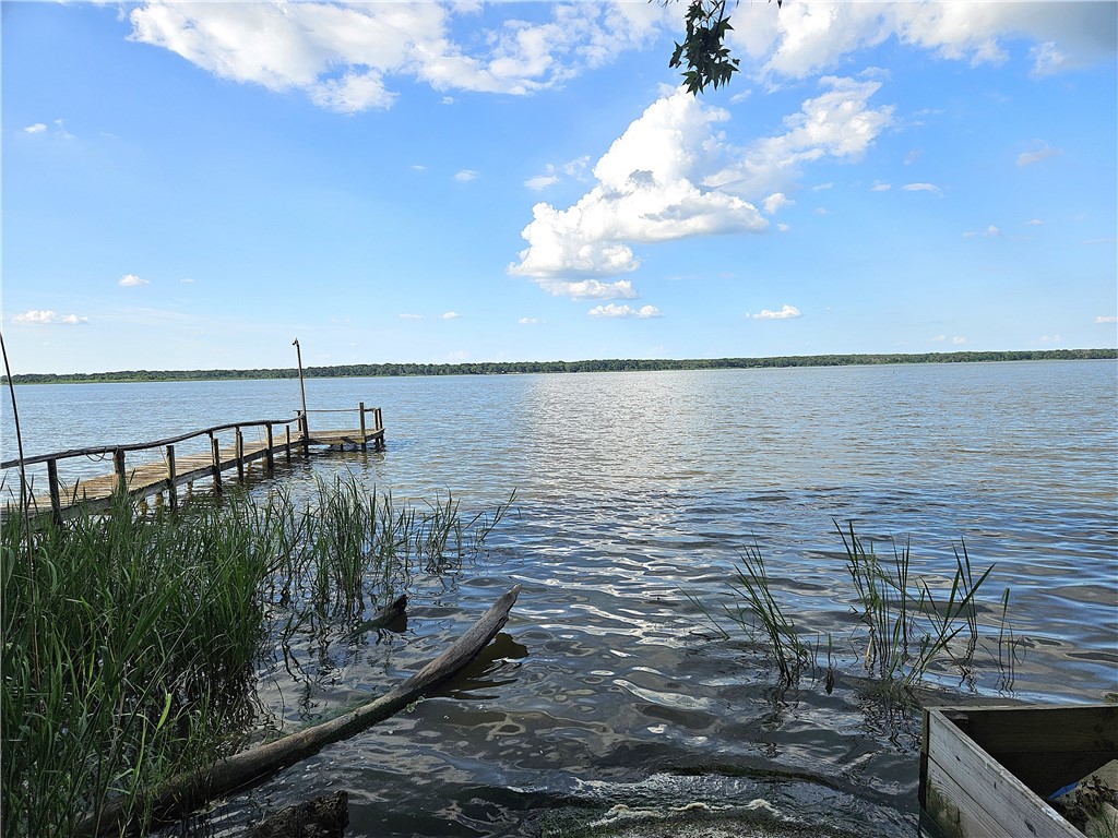 a view of a lake from a balcony