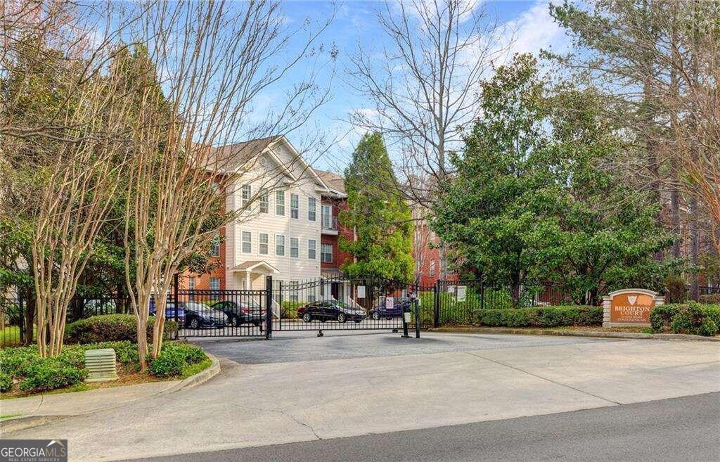 a building exterior with trees