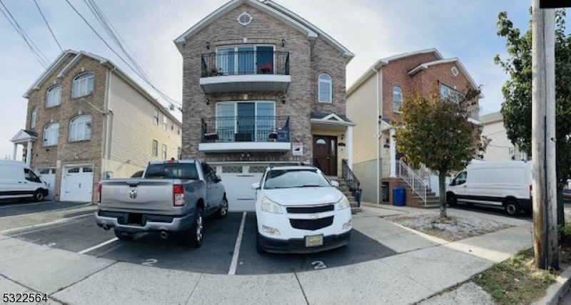 a car parked in front of a house