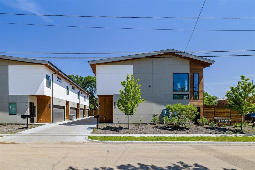 a house with swimming pool in front of it