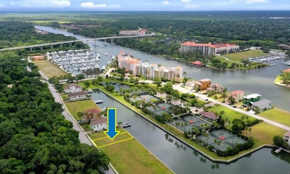 an aerial view of a houses and an outdoor space