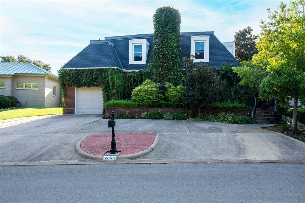 a house view with a swimming pool