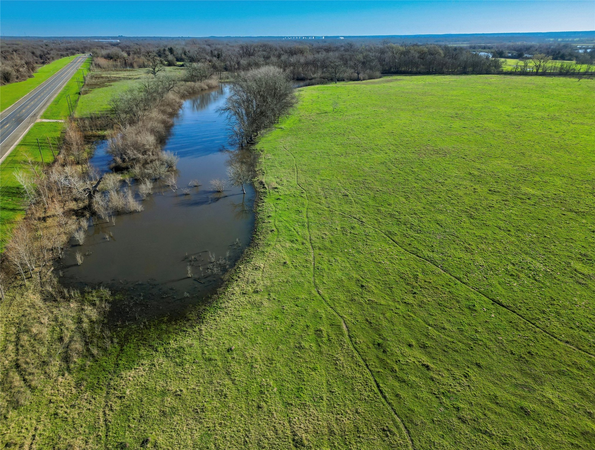 a view of a lake from a yard