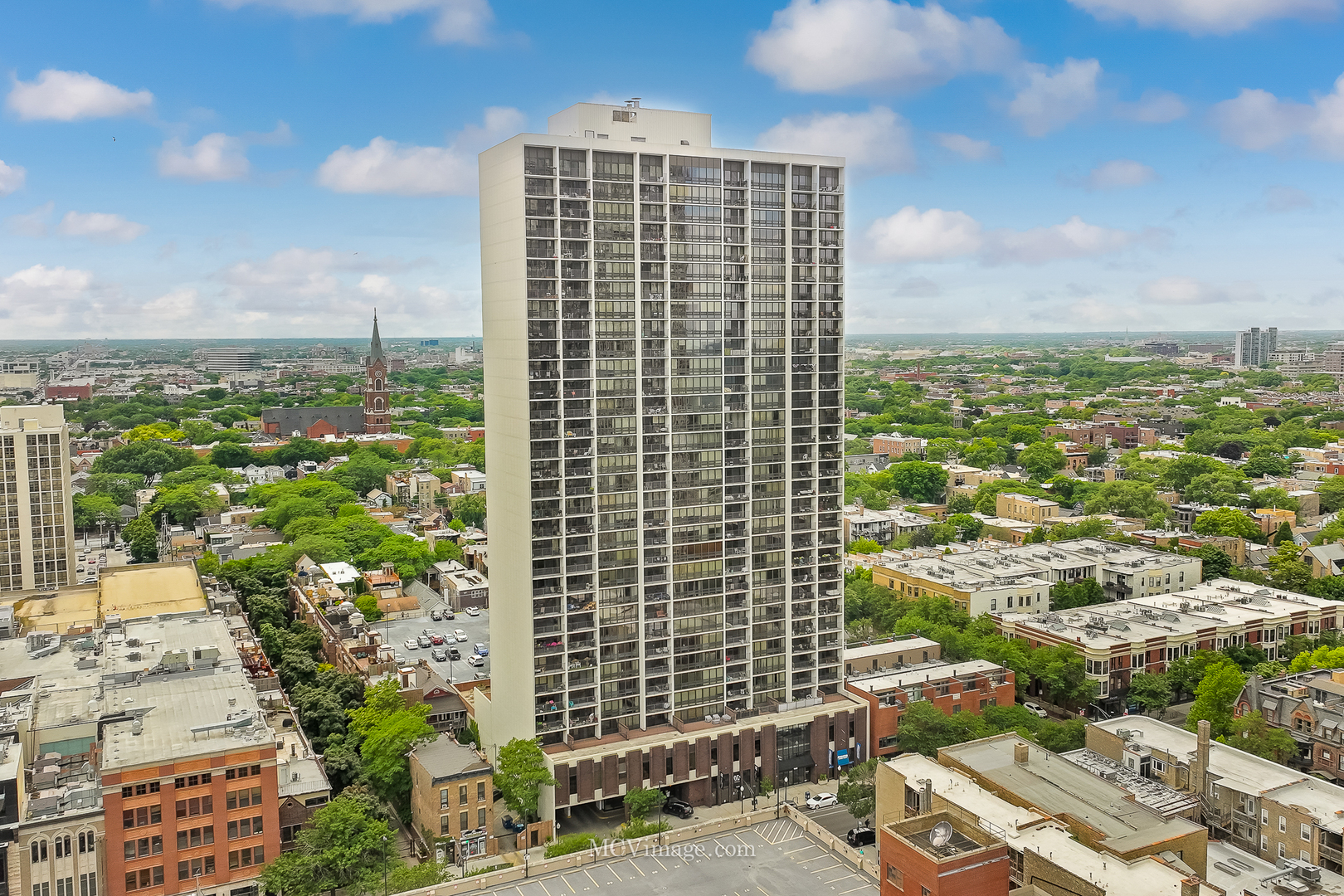 a view of a city with tall buildings