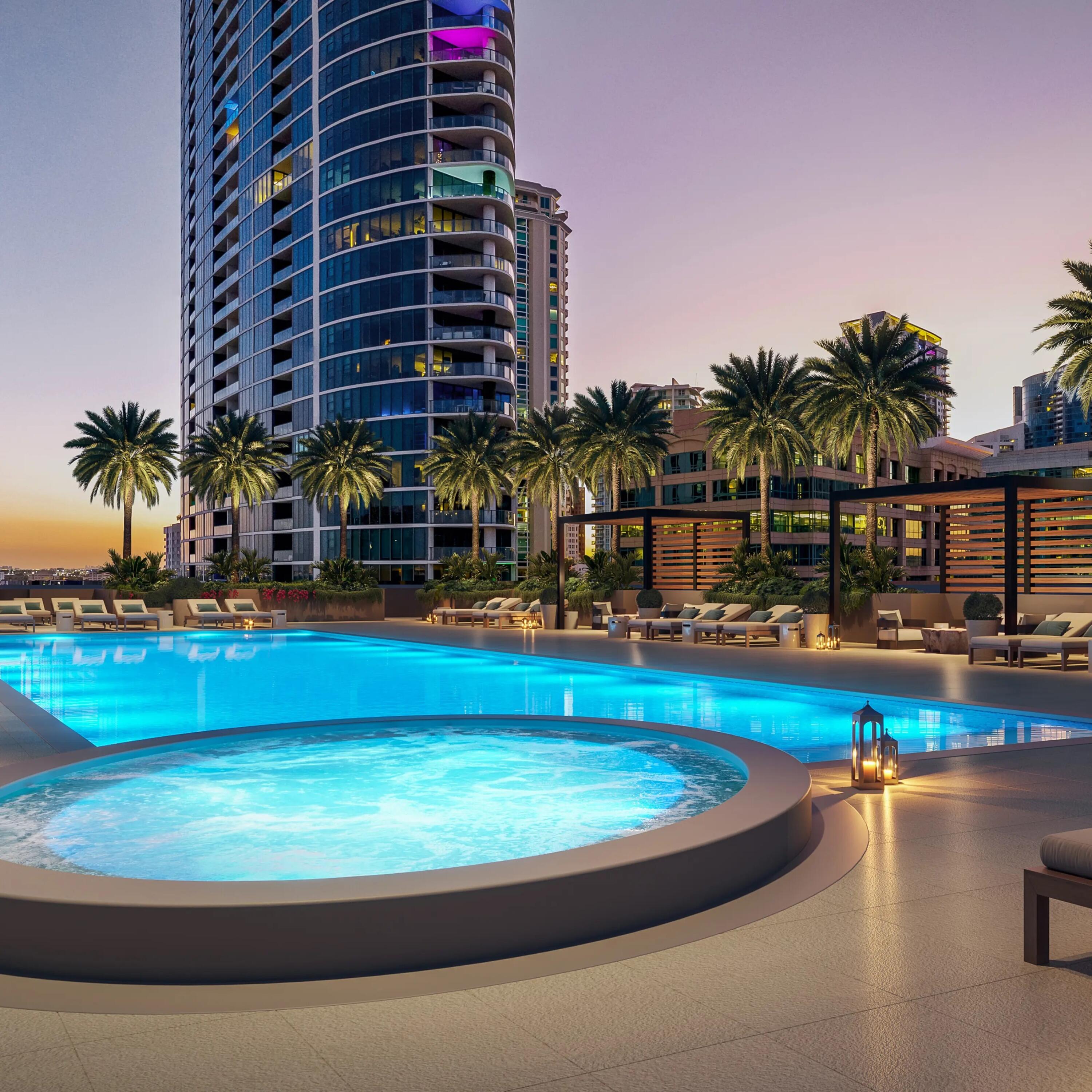 a view of swimming pool with outdoor seating