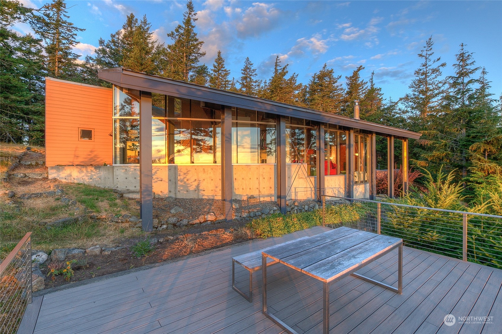 a view of a deck with wooden floor and outdoor space