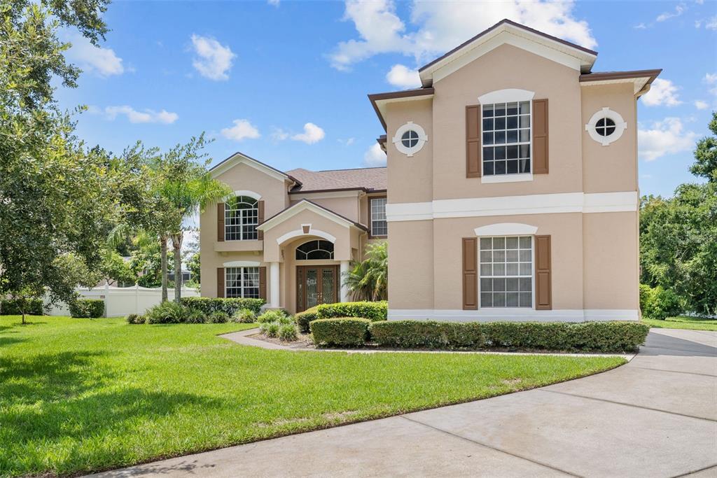 front view of a house with a yard