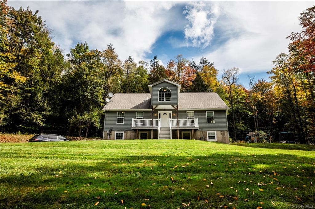 a front view of house with yard