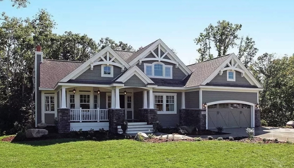 front view of a house with a yard