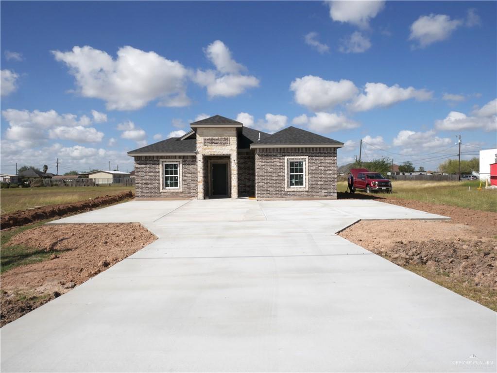 a view of a house with a patio