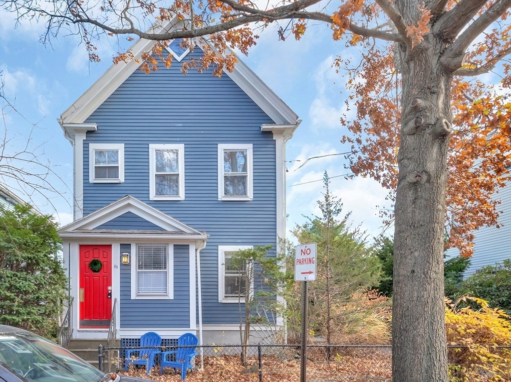 a front view of a house with yard