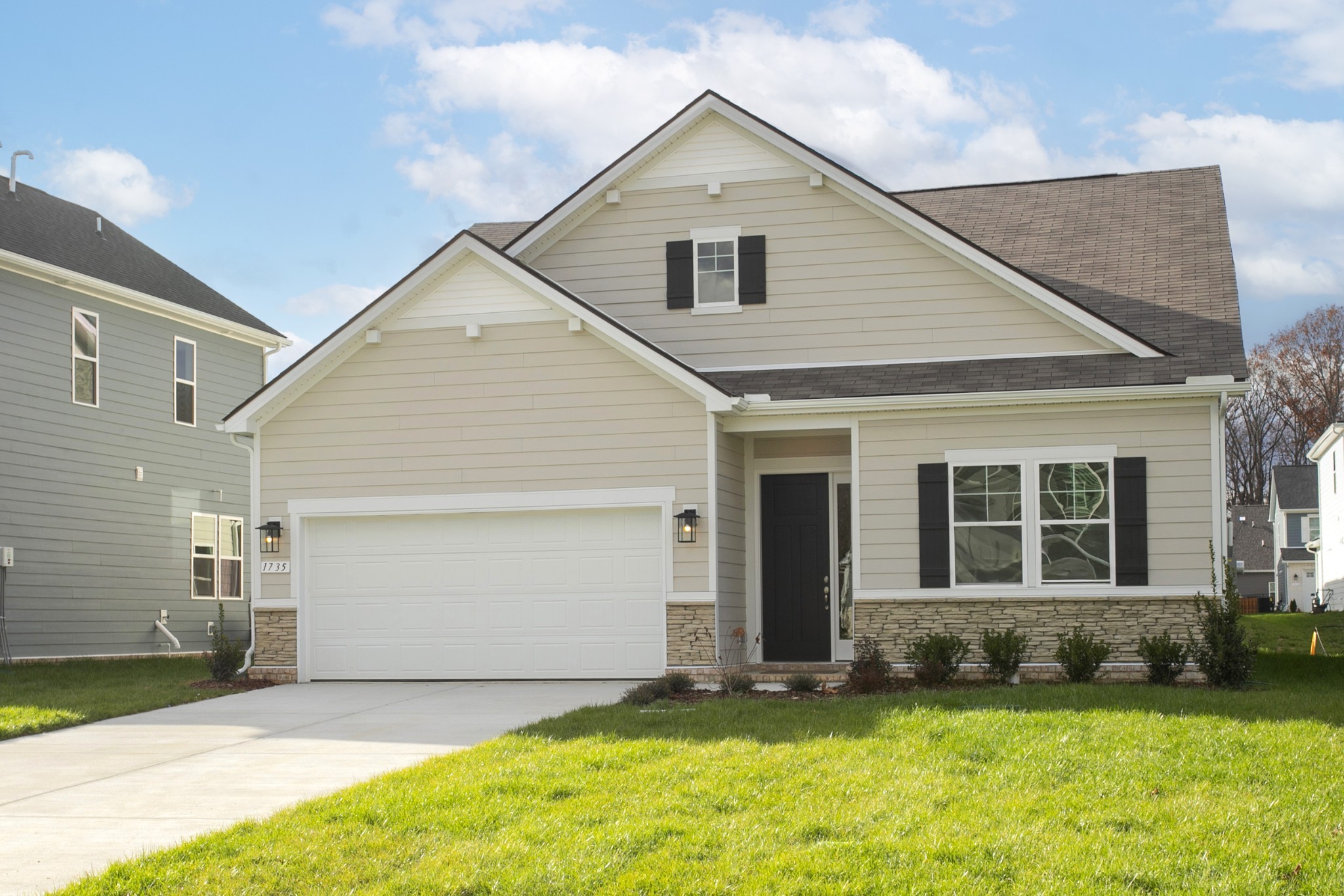 a view of a house with a yard