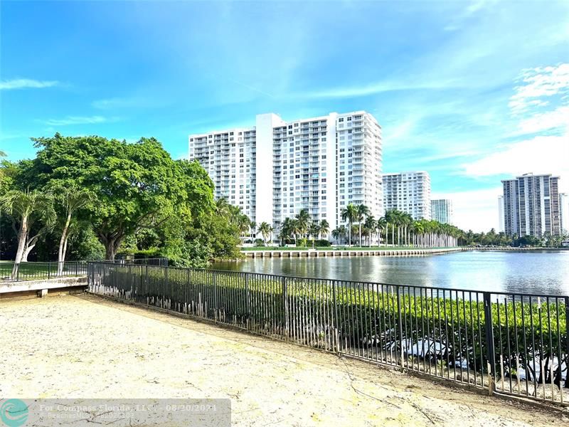 a view of a lake with a city