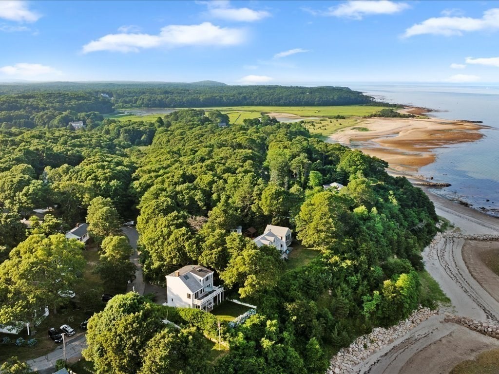 a view of a lake with a yard