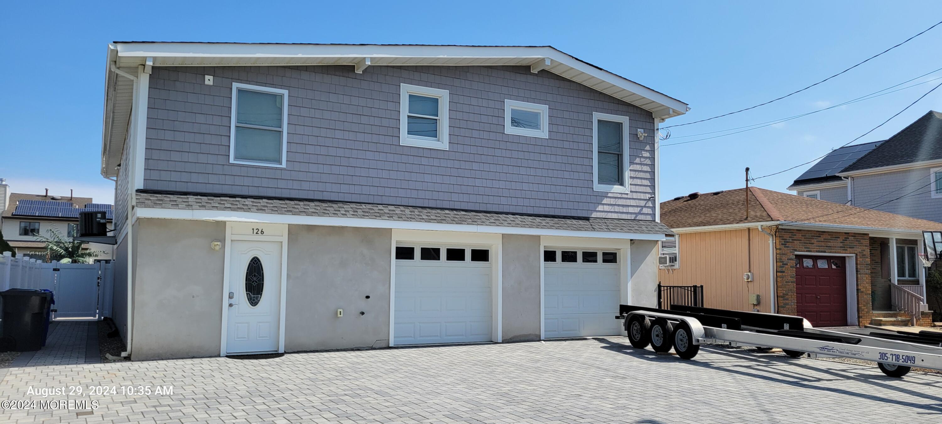 a front view of a house with windows