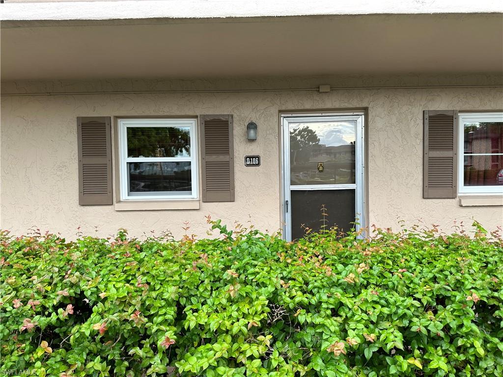 front view of a house with a small yard